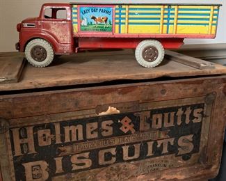 Antique lidded wooden Holmes & Coutts biscuit box with outstanding interior paper detail, early MARX tin litho Dairy truck
