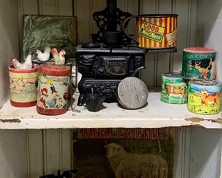 Plethora of antique to vintage cast iron children’s toy stoves, hand crank chicken novelty noisemakers, De Laval cream separator & Tobacco Tip trays, early farm advertising, hard plastic cow toys