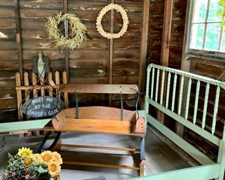 Assorted wreaths, antique painted wood cottage bed frame