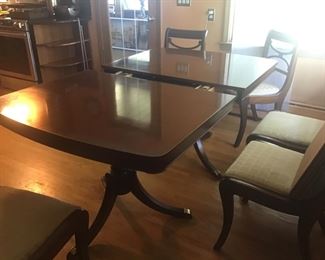 Solid wood dining table with 2 inserts and 6 chairs -$300. 