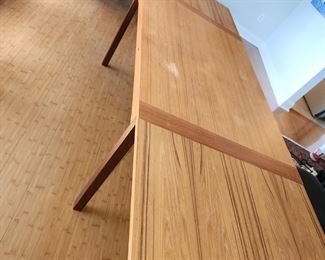 mid century modern dining table, both ends pull out as extension. Slight damage to one spot on top