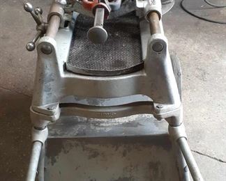 Ridgid 535 Pipe Threader with Cradle, Foot Pedal, Reamer, Pipe Cutter and Adjustable Die.  Not to mention the Cart with the Oiler!