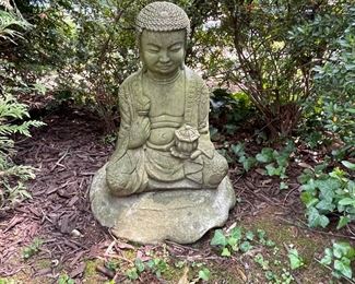 Concrete Buddha lawn statue (also pretty heavy!).