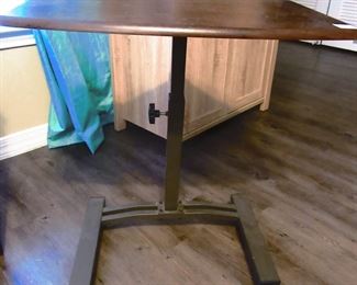 Bedside or couch serving tray on wheels.