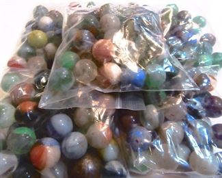 Five small bags of vintage marbles. Sold by the bag.