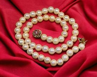 Strand of Pearls With 14K Gold, Diamond Ruby Clasp