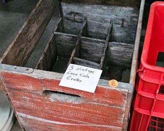 THREE VINTAGE COCA COLA CRATES