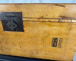 $1500, Antique Korean pigskin chest on black lacquer stand