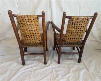 $1800 PAIR, 1940's Old Hickory High Back arm chair has original open weave rattan cane seat and back