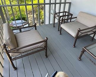 $275 each oversized arm chairs; $175 each ottomans; $175 each tables