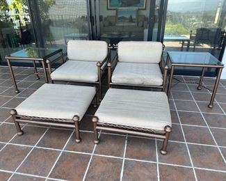 $275 each oversized arm chairs; $175 each ottomans; $175 each tables