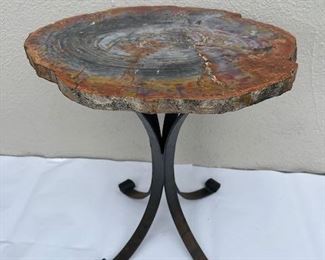 $1450 each, Petrified wood and wrought iron side tables