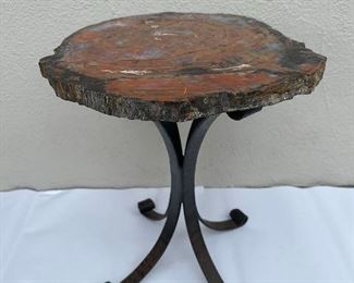 $1450 each, Petrified wood and wrought iron side tables