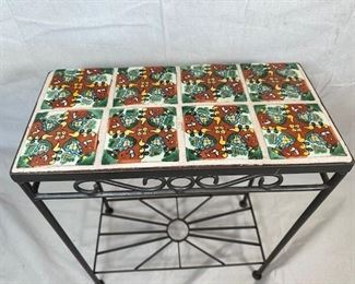 $550, Italian tile and iron side table. 18.5 x 9 x 23