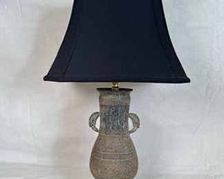 $400, incised Mayan lamp