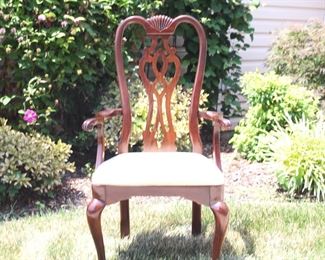 Arm chair with beautiful back. One of six.