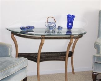 Pair of Ethan Allen wingback chairs shown with glass top console table.