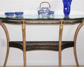 Glass top console table.