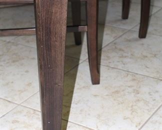 Detail of legs of previously pictured table.