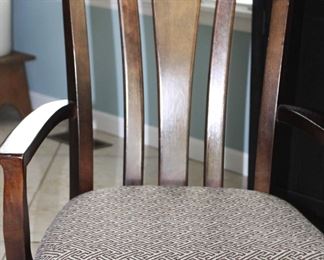 One of the six custom upholstered chairs.