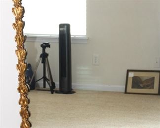 Beautifully framed vintage mirror.