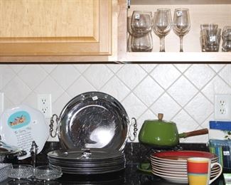 Lots of clean kitchen items.