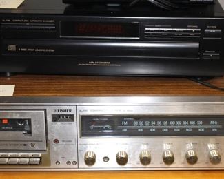 Fisher and JVC stereo equipment pieces.