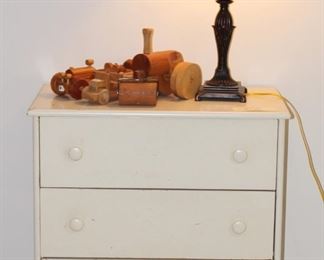 Child's chest of drawers with hand crafted wood toys.