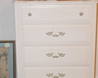 Chest of drawers with hand crafted wood toys.