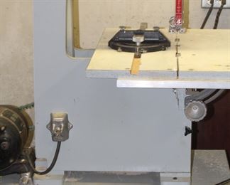 Band saw on stand.
