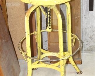 Vintage metal industrial stool.