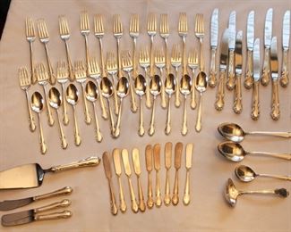 Rogers Wedding Bells sterling flatware set. Four piece service for eleven plus serving pieces. NOTE: Silver and gold is never left unattended or on property overnight.