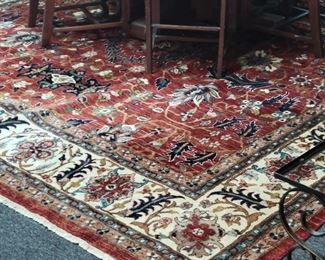 Agra rug 10x14 terracota and burnt orange tones.