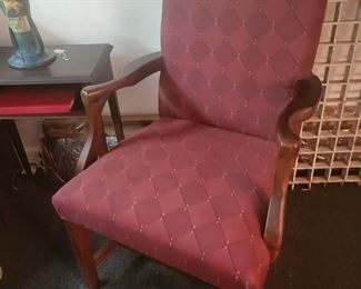 Burgundy arm chair.