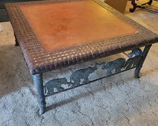 Hand forged coffee table w/ elephant hide top