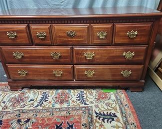 Dresser has mirror and is part of set