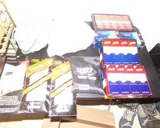 bulk lot of new and used golf balls and gloves