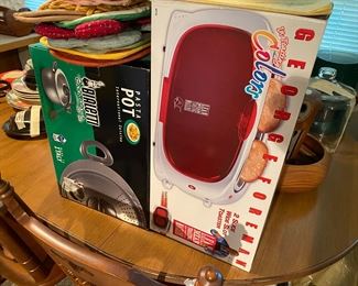 Lots of new in box items in kitchen