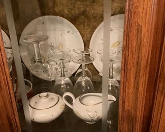 Close up of set of China in China cabinet 