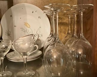 Close up of set of China in China cabinet 