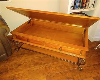 Coffee table with hinged top