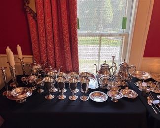 The sterling table!  Sterling gravy and underplate, 3 sterling silver tea-sets, goblets, Strausbourg flatware, candle holders, serving bowls, bud vases, bon bon dishes, misc serving pieces 