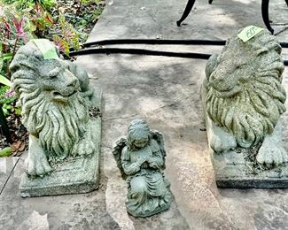 A pair of vintage lion statues