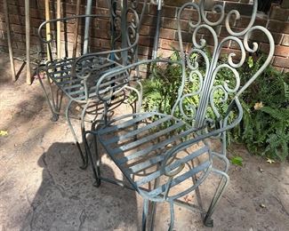 we have a pair of these HEAVY iron armchairs!! Very unique!
