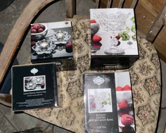 Shannon Crystal Lotus candlesticks (2) pairs and footed candy dish (2) still in original packages