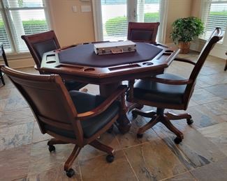 Game table with chairs. 
Top reverses to solid wood.