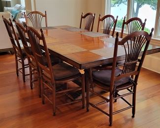 Dining table and 8 chairs by Nichols and Stone Furniture 