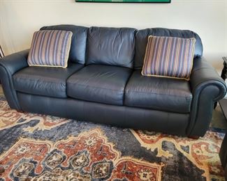 Black leather sofa and loveseat by Lane Furniture 