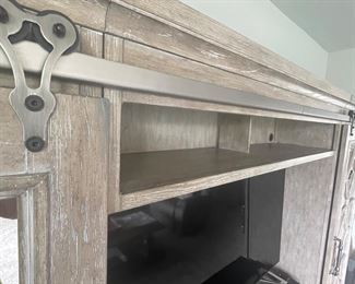 Entertainment center with two sliding doors