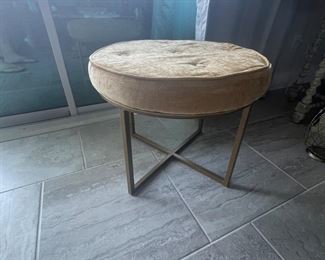 Yellow fabric and metal bench